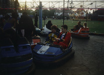 photo of Patrick and John in a bumper car at Newnham College May Ball