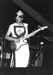 Photo of Patrick Sheil playing at the 'Camelot' May Ball, Selwyn College, 1995.