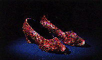 Photo of the ruby slippers from the Wizard of Oz, linking to a page about the song Love.